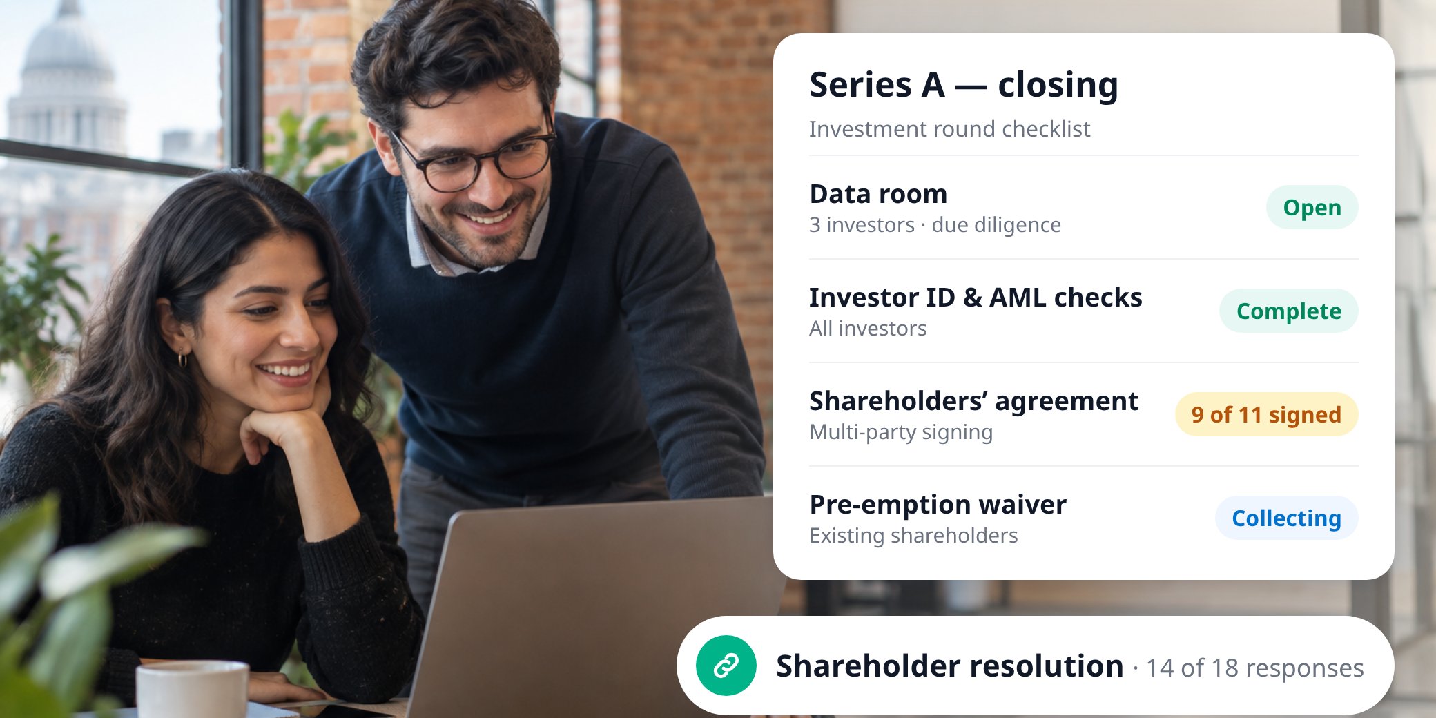 Two founders at a laptop during a Series A round, with a MyDocSafe closing checklist covering the data room, investor ID and AML checks, shareholders&rsquo; agreement signing and a shareholder resolution